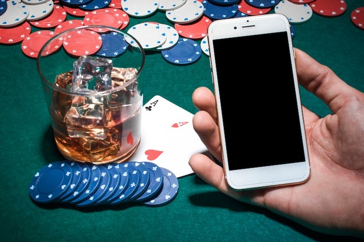 Philippine player using iq7777 app on a smartphone at home
